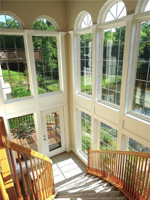 sunroom / solarium featuring plenty of natural light