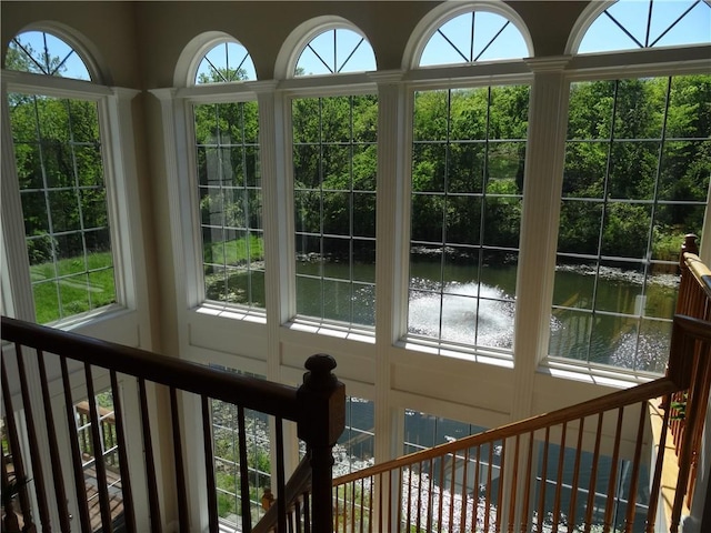 interior space featuring a water view