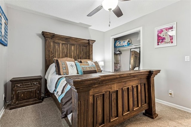 bedroom with carpet flooring, a closet, and ceiling fan