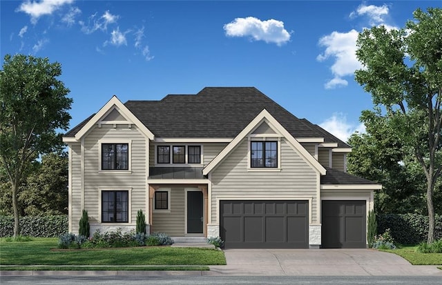 view of front of property featuring a front yard and a garage