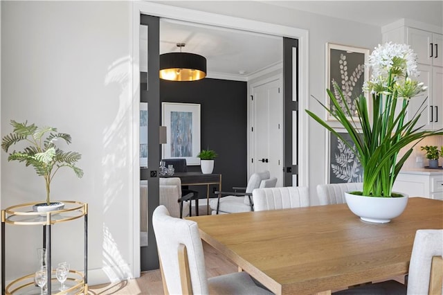 dining room with light wood-style floors