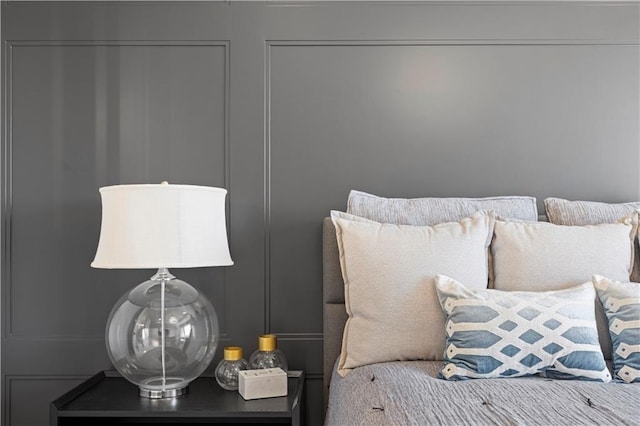 bedroom with a decorative wall