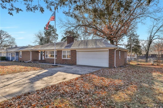 ranch-style home featuring a garage