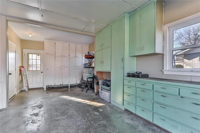 kitchen featuring green cabinets