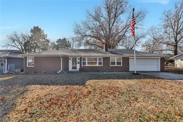 single story home featuring a garage