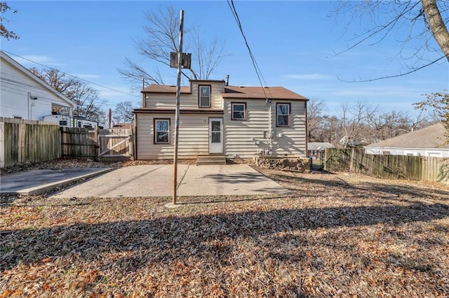 back of house featuring a patio