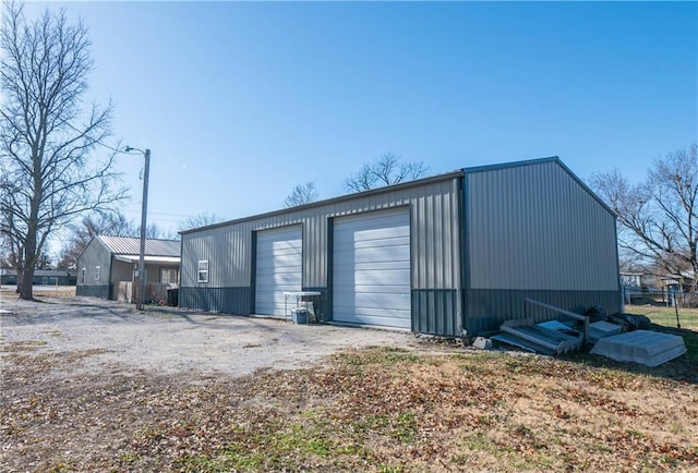 view of outbuilding with a garage