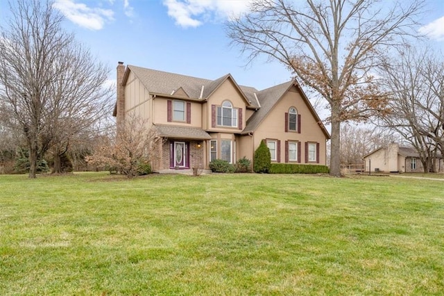 view of front facade with a front lawn