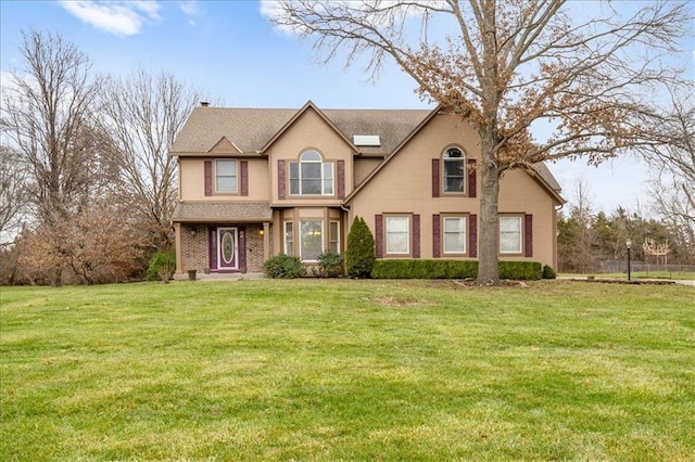 view of front facade with a front yard