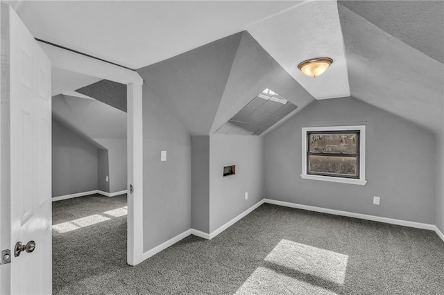 bonus room featuring carpet and lofted ceiling