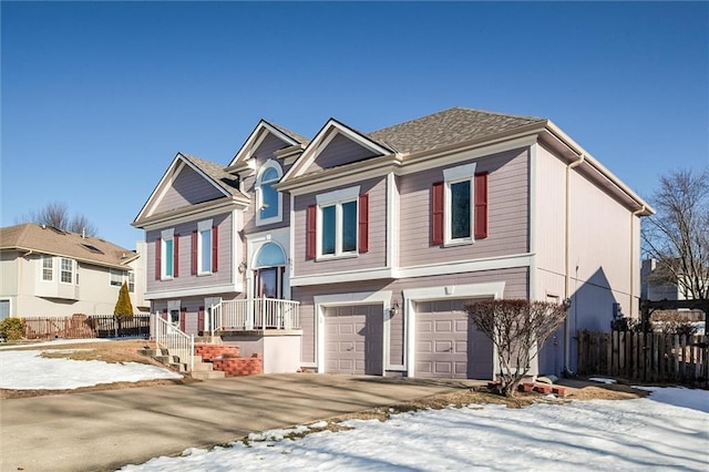 bi-level home featuring a garage