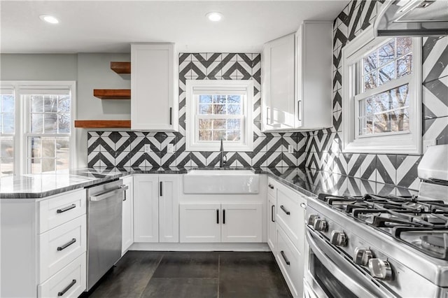 kitchen featuring sink, white cabinets, and a healthy amount of sunlight