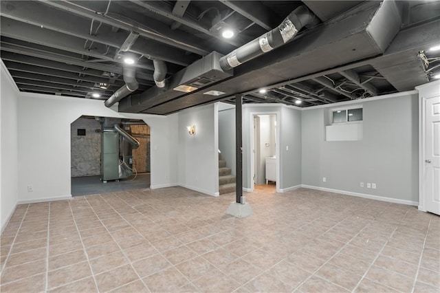 basement featuring heating unit