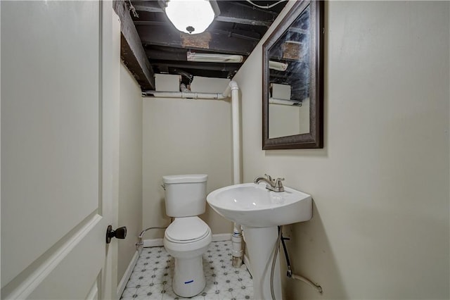 bathroom featuring toilet