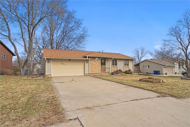 ranch-style home featuring a garage, concrete driveway, brick siding, and a front lawn