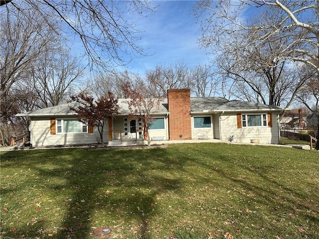 view of front of home with a front yard