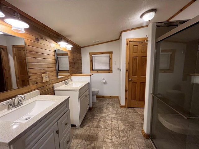 bathroom with wood walls, vanity, lofted ceiling, and walk in shower