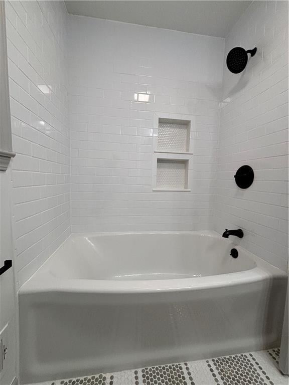 bathroom featuring shower / tub combination and tile patterned floors