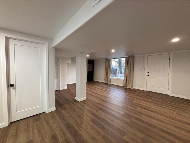 basement with dark wood-type flooring