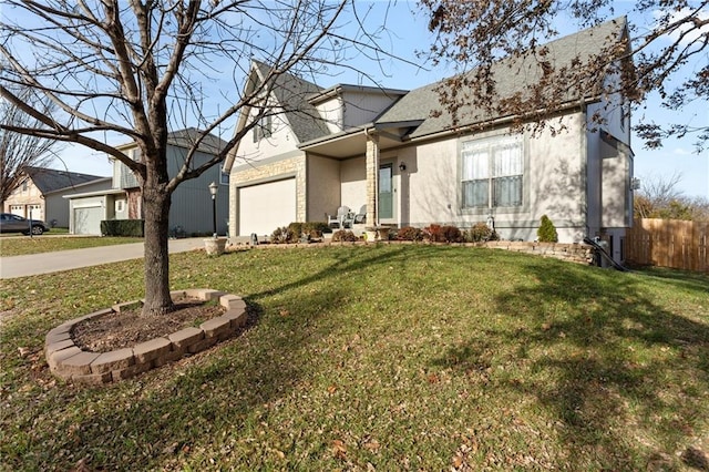 view of front of property featuring a front lawn, fence, stucco siding, a garage, and driveway