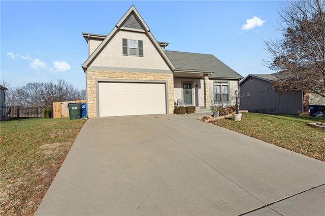 view of front of house featuring a garage and a front lawn