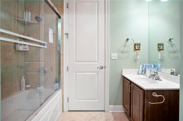 bathroom with shower / bath combination with glass door, tile patterned flooring, and vanity