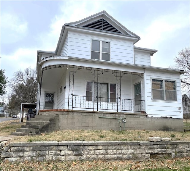 view of front of home featuring covered porch