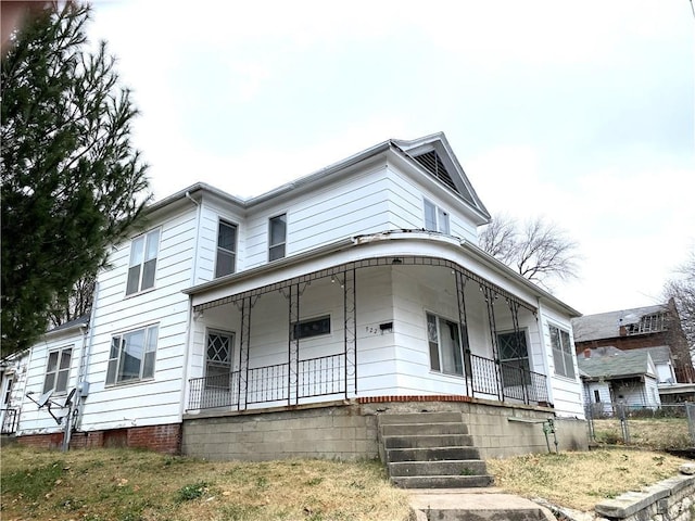 view of front facade featuring covered porch