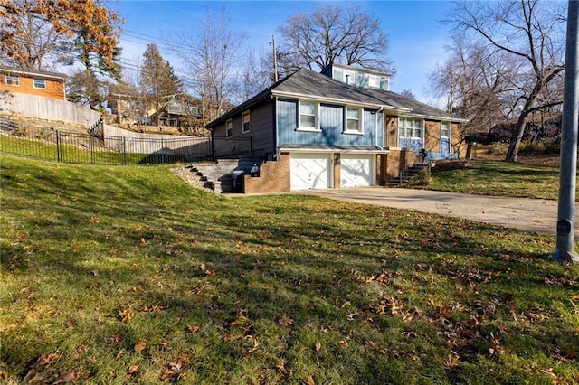 view of side of home featuring a lawn and a garage