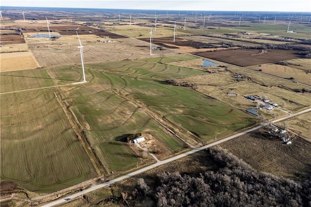 birds eye view of property with a rural view