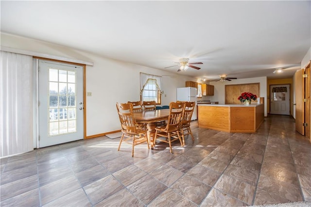 dining area featuring ceiling fan