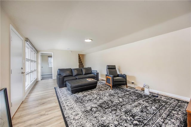 living room with light hardwood / wood-style flooring