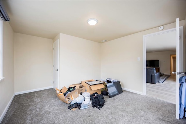 miscellaneous room with carpet