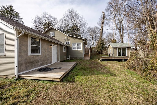 view of yard featuring an outbuilding and a wooden deck