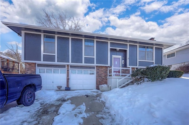 split foyer home featuring a garage