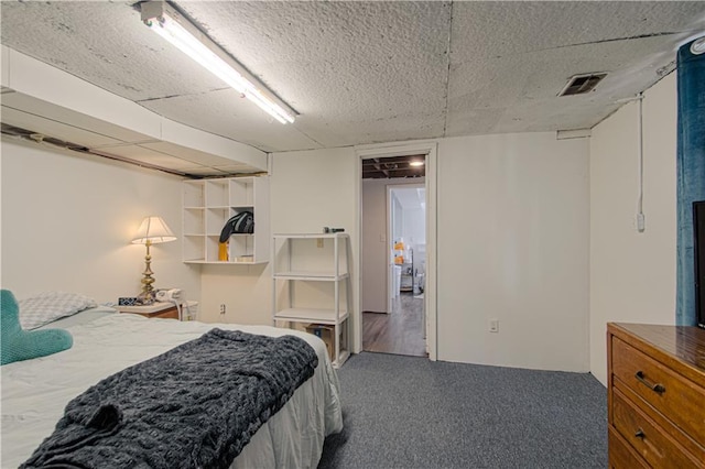 bedroom with visible vents and carpet floors