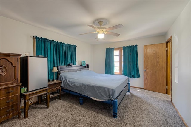 carpeted bedroom featuring a ceiling fan