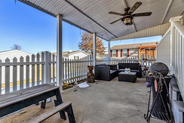 view of patio / terrace with an outdoor living space and ceiling fan