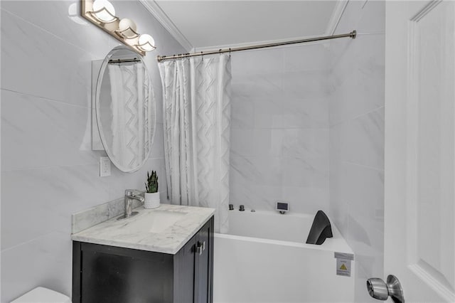 full bathroom with vanity, crown molding, toilet, and shower / bath combo