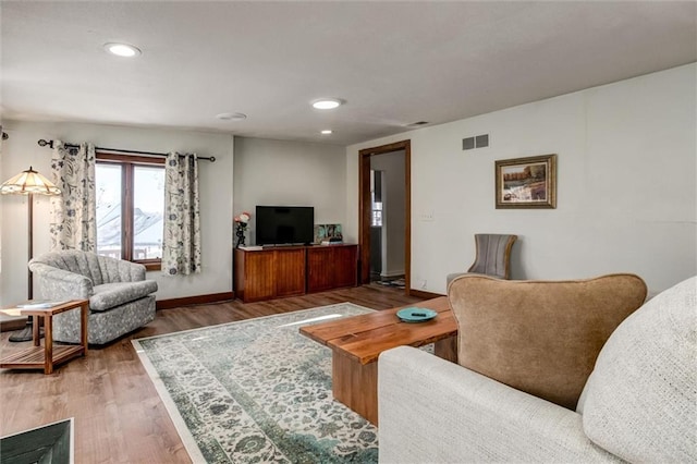 living room with hardwood / wood-style flooring