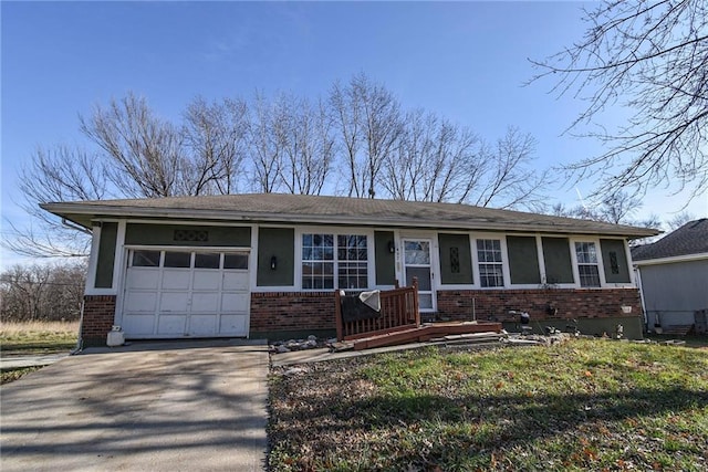 view of front of property with a garage and a front lawn