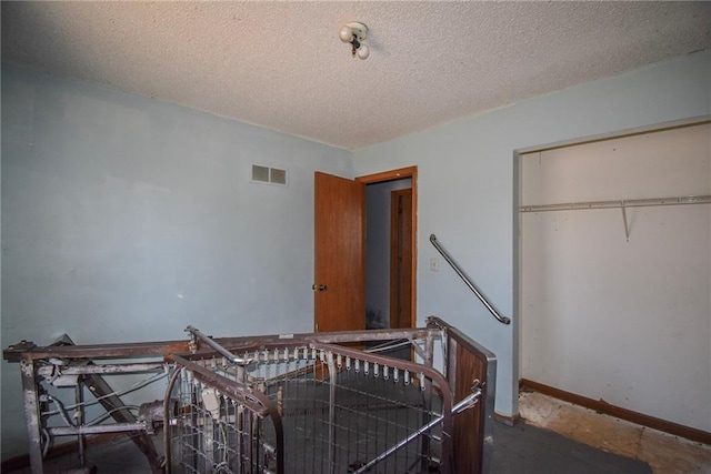 bedroom with a textured ceiling