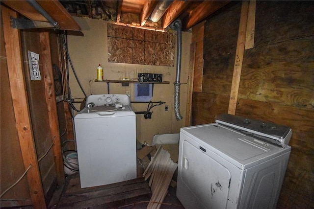 laundry area featuring washing machine and clothes dryer