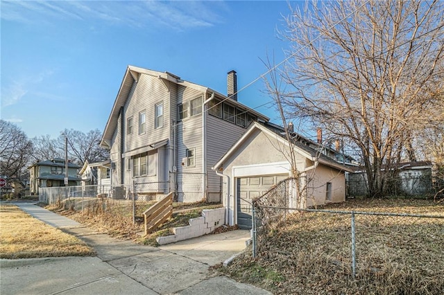 view of property exterior featuring a garage