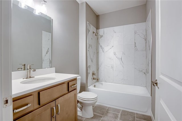 bathroom featuring bathing tub / shower combination, toilet, and vanity