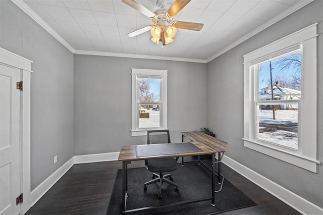 office space with ceiling fan, dark wood-type flooring, and ornamental molding