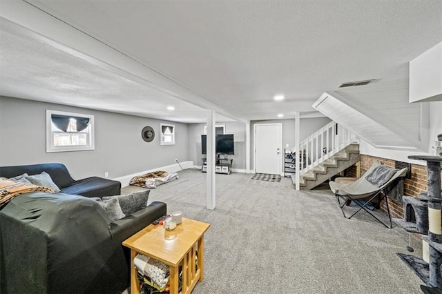 carpeted living room with a wealth of natural light