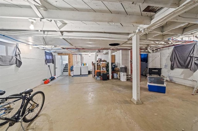 basement featuring washer and dryer