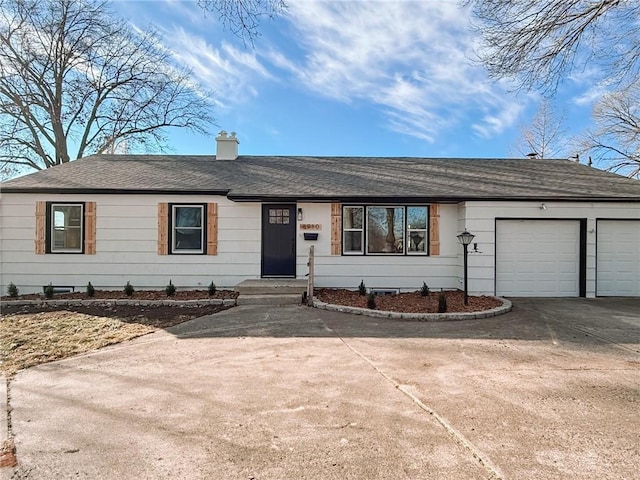 ranch-style home with a garage