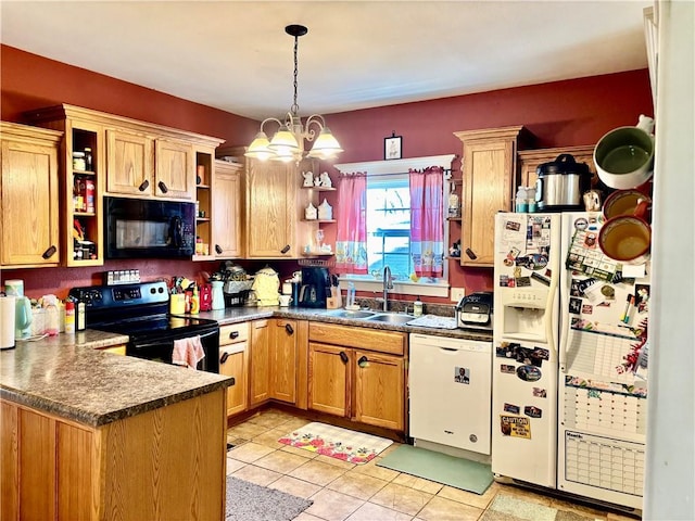 kitchen featuring sink, hanging light fixtures, kitchen peninsula, a notable chandelier, and black appliances